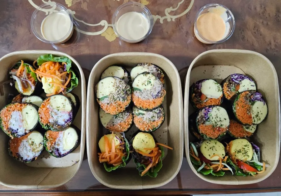 Three types of keto gimbap arranged side by side on a plate