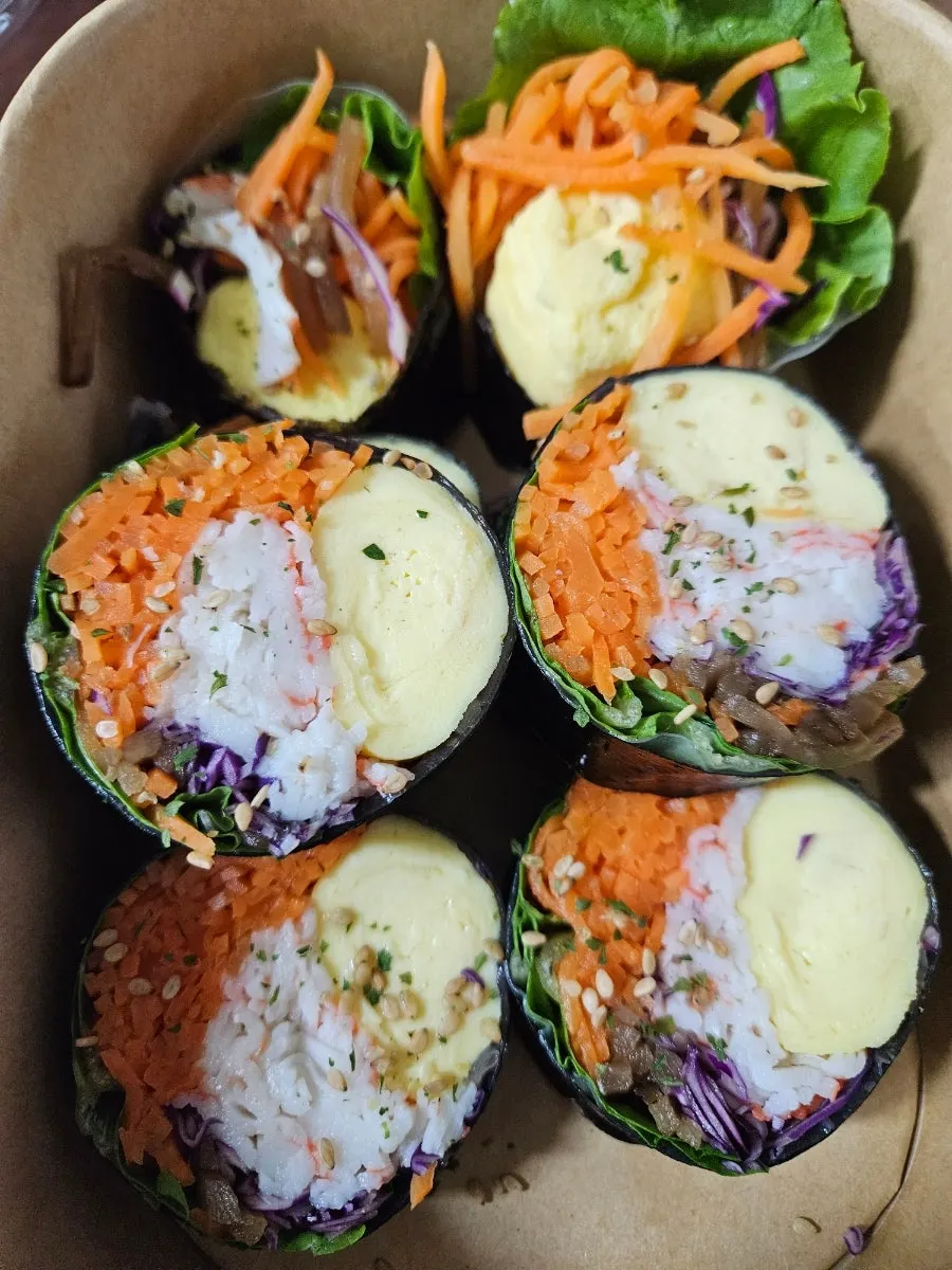 Vertical photo of keto gimbap showing the thick egg roll