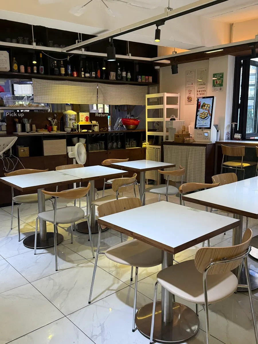 Clean, well-designed seating in the gimbap restaurant