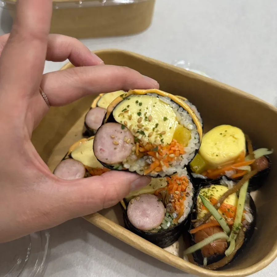 Whole sausage cheese gimbap with carrot and burdock root inside