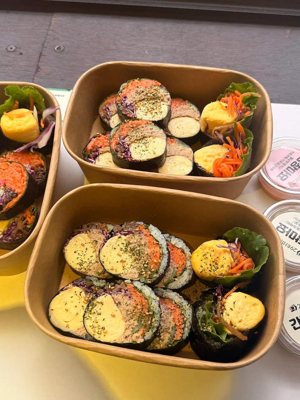 Cross-section of tuna-full gimbap packed with egg and tuna