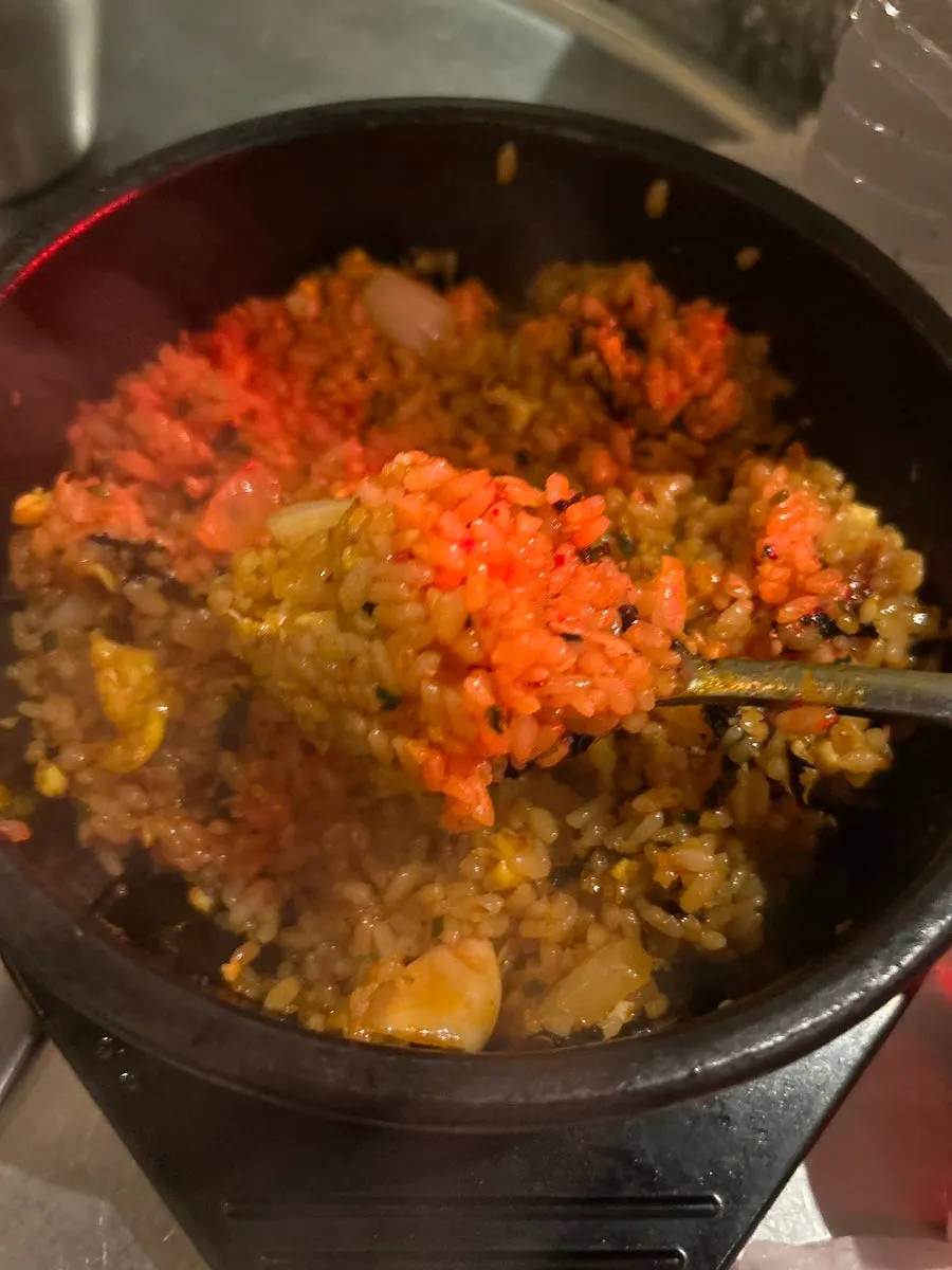 Jeotgal fried rice topped with squid jeotgal