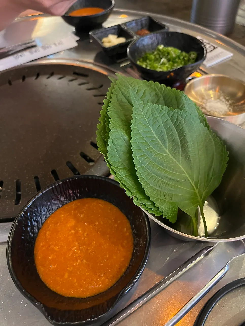 Basic side dish spread with perilla leaves and scallion salad