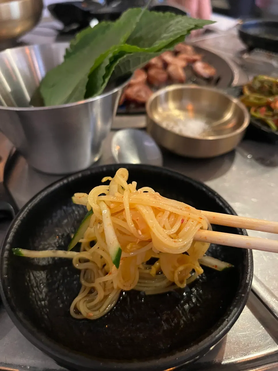 Kimchi mari guksu enjoyed as the finishing dish