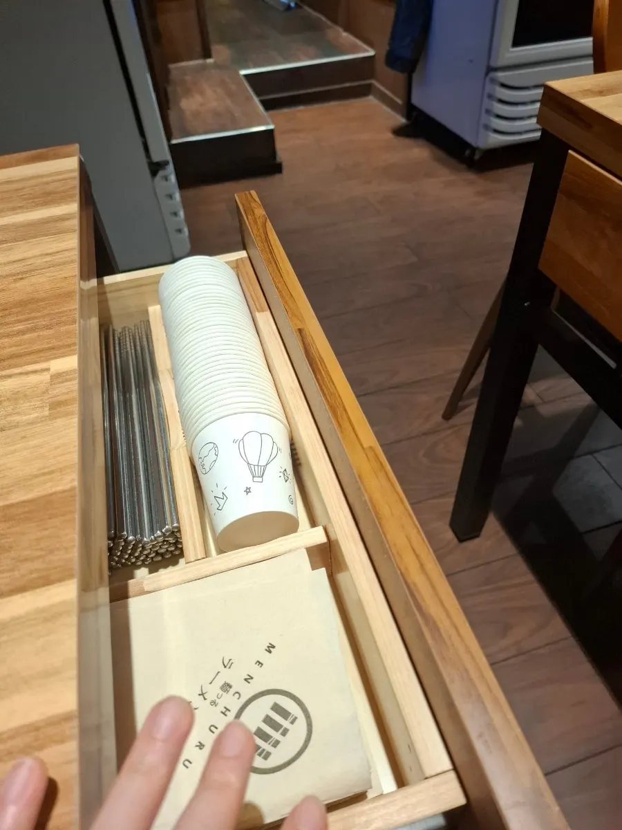 Menu at Mentsuru Euljiro Branch showing the tsukemen listing
