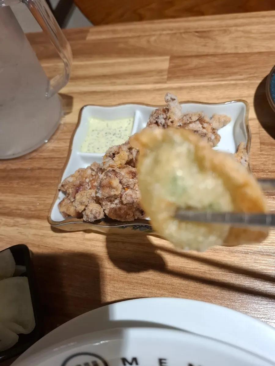 Tsukemen dipping sauce with bits of meat inside