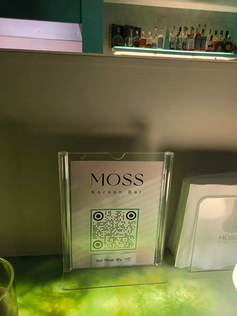 QR code linking to the Notion menu