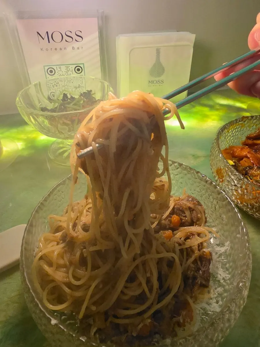 Cross-section of the doenjang ragu pasta with capellini noodles