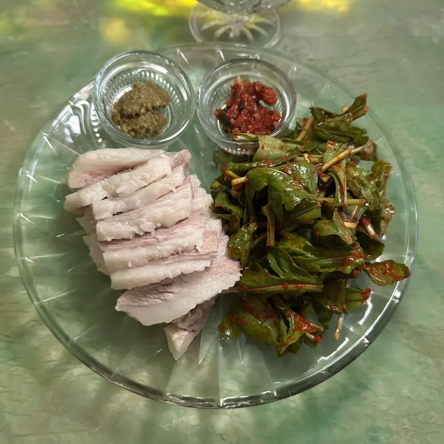 Three basic side dishes: yeolmu kimchi, namul, and pickled cucumber