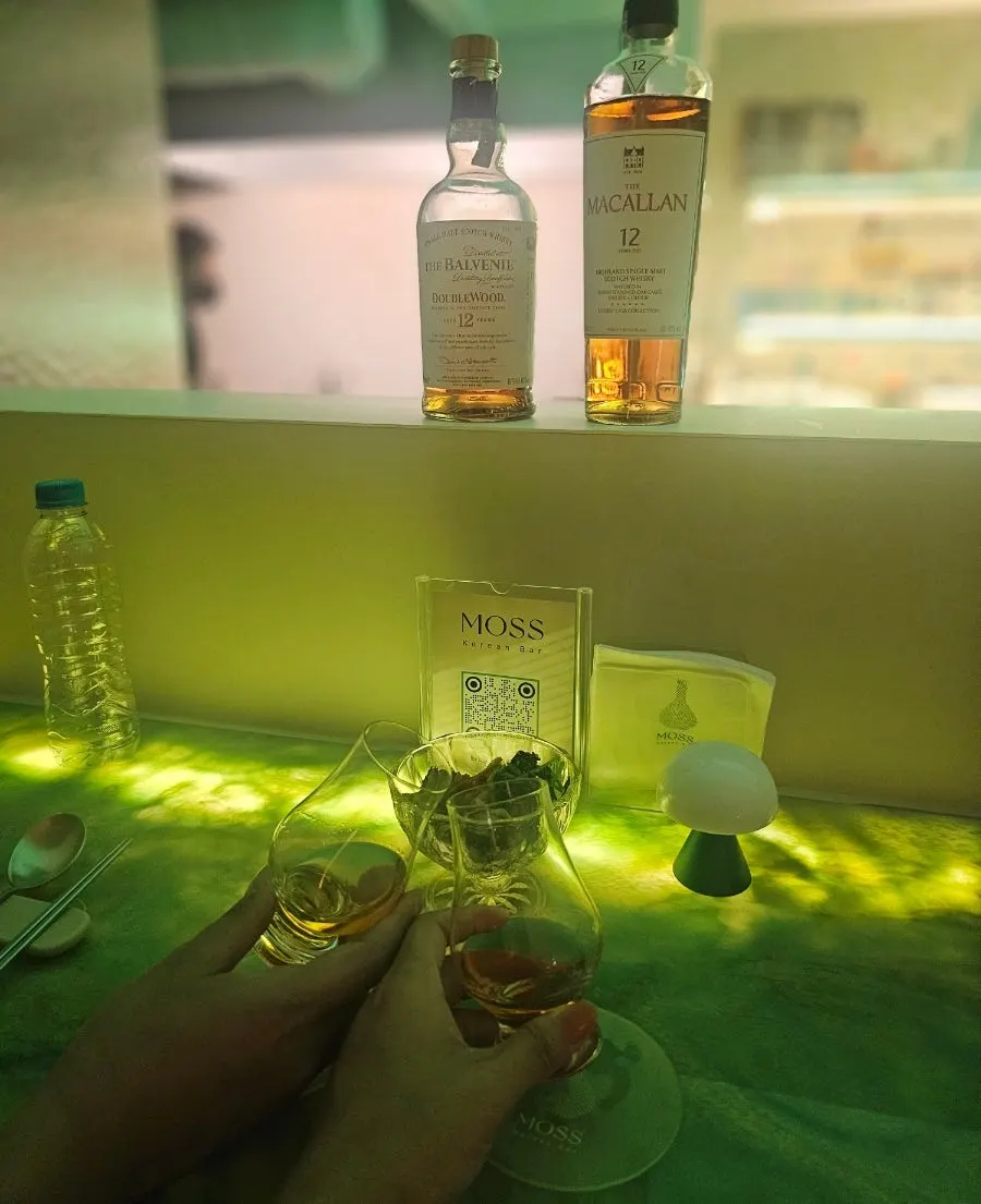 Glasses of 12-year whiskey poured