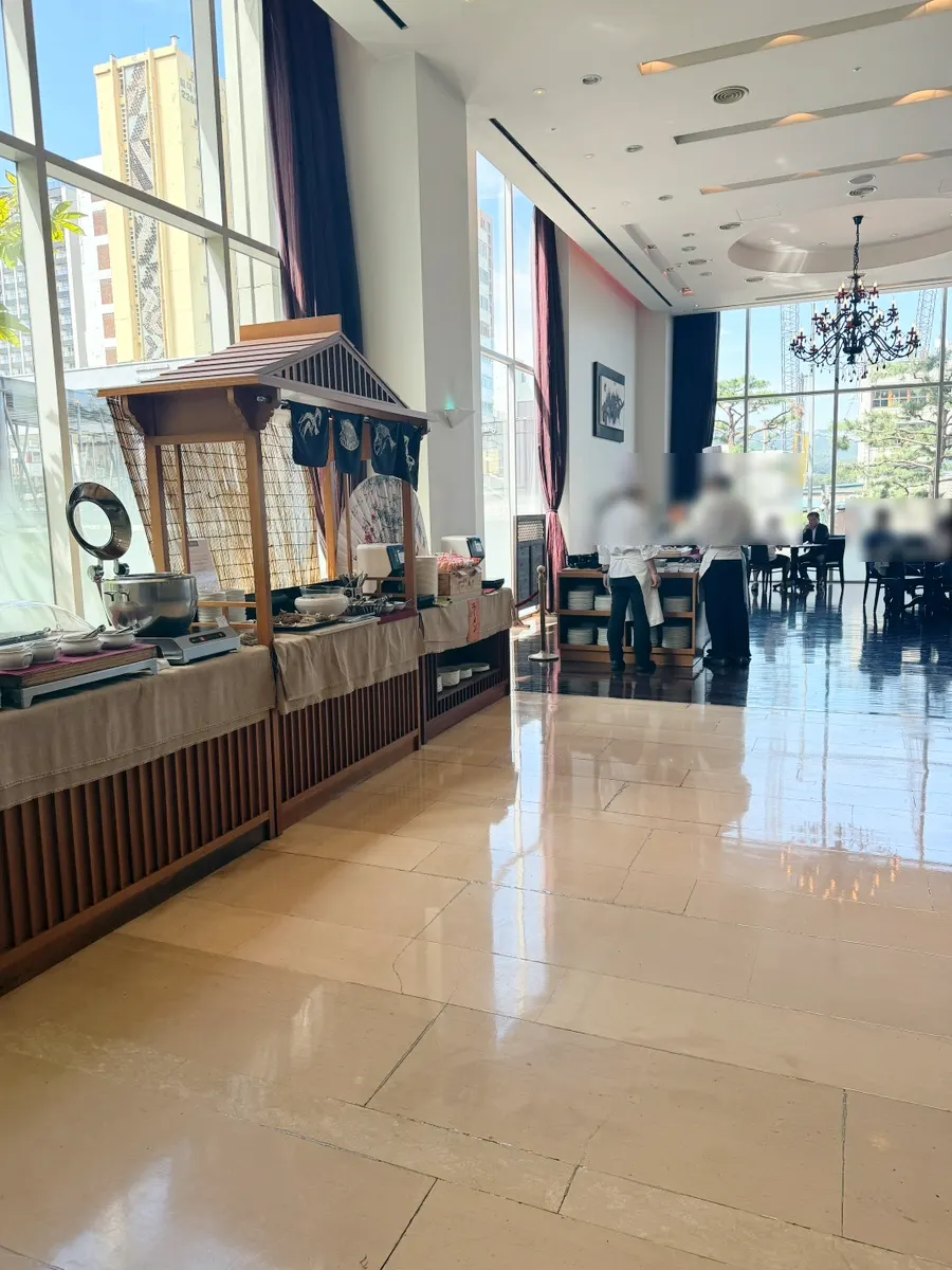 Hotel Kukdo Patio interior with large floor-to-ceiling windows