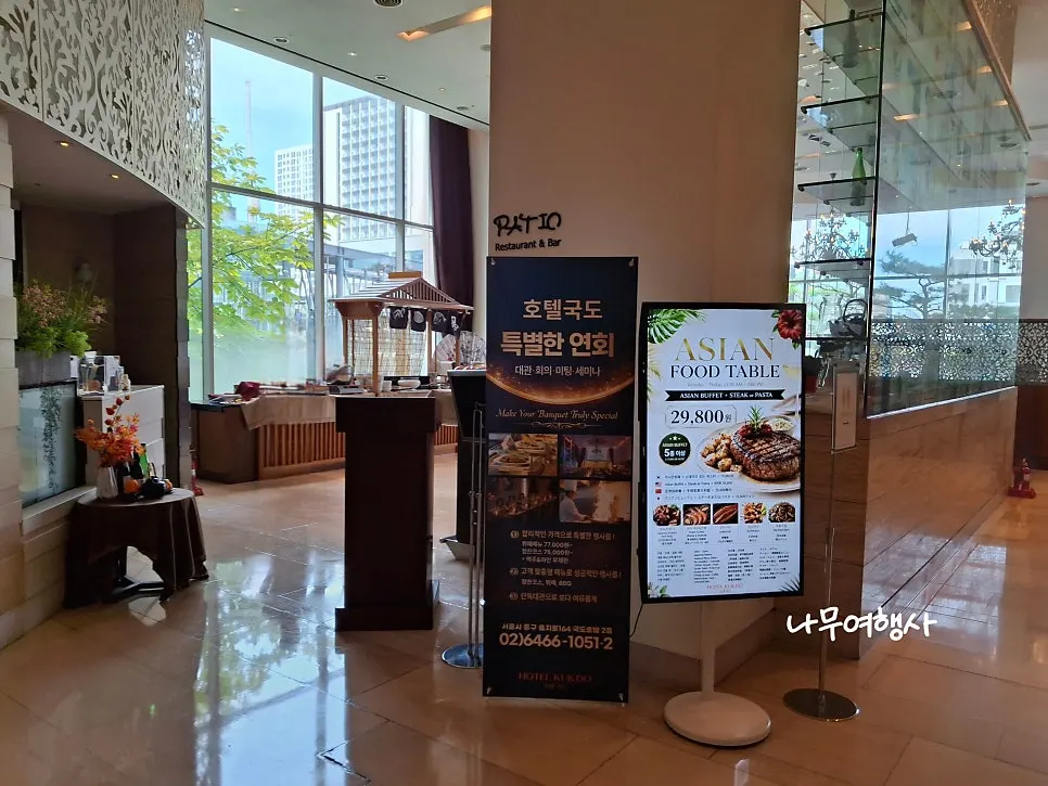 Asian buffet banner leading to Patio on the second floor