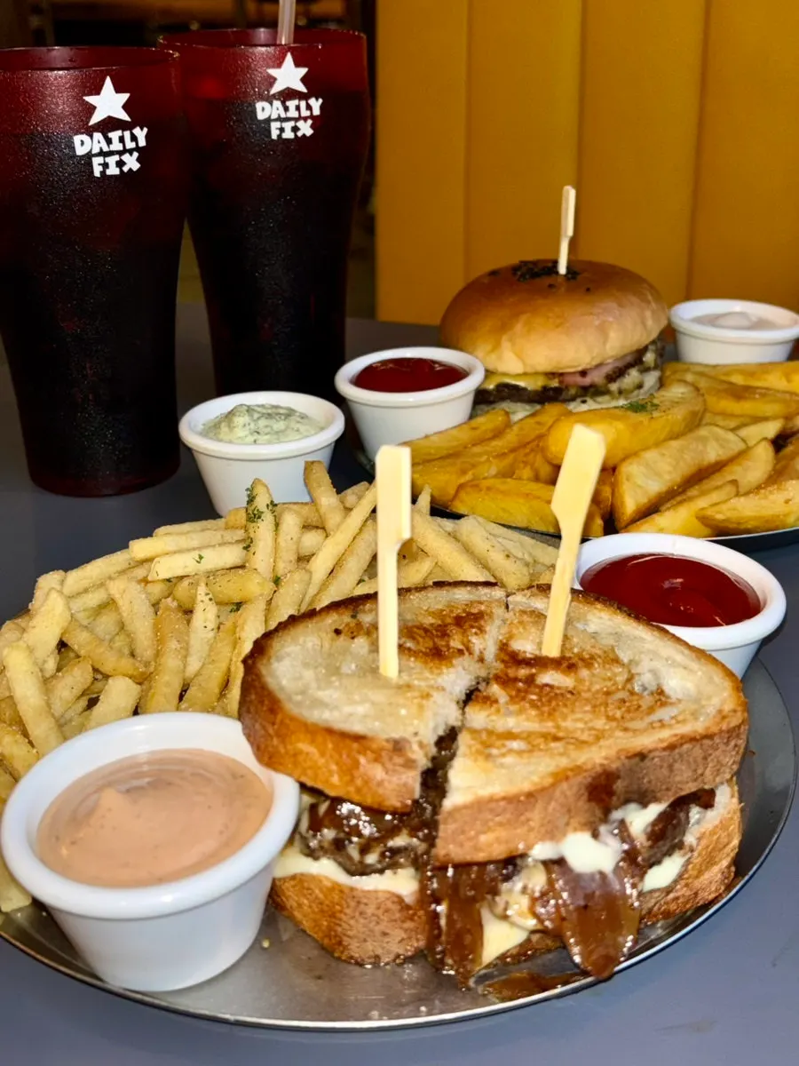 Vertical photo of a handmade burger at Daily Fix Euljiro