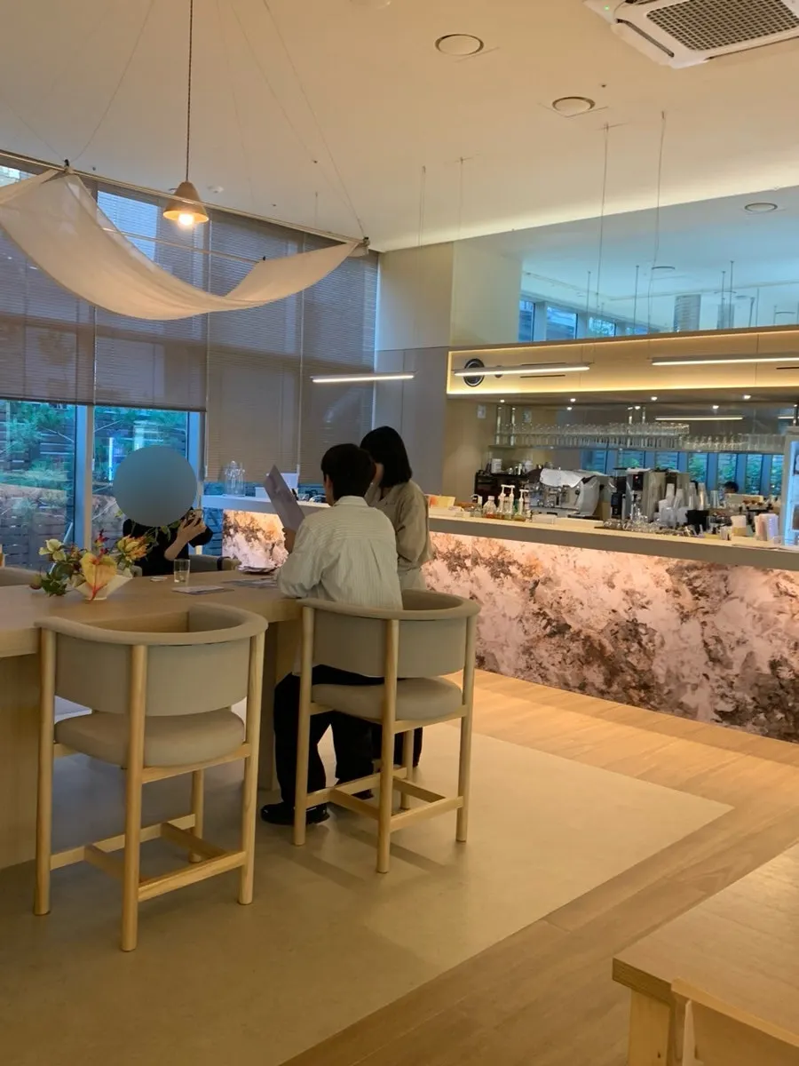 Interior photo with wood-toned tables
