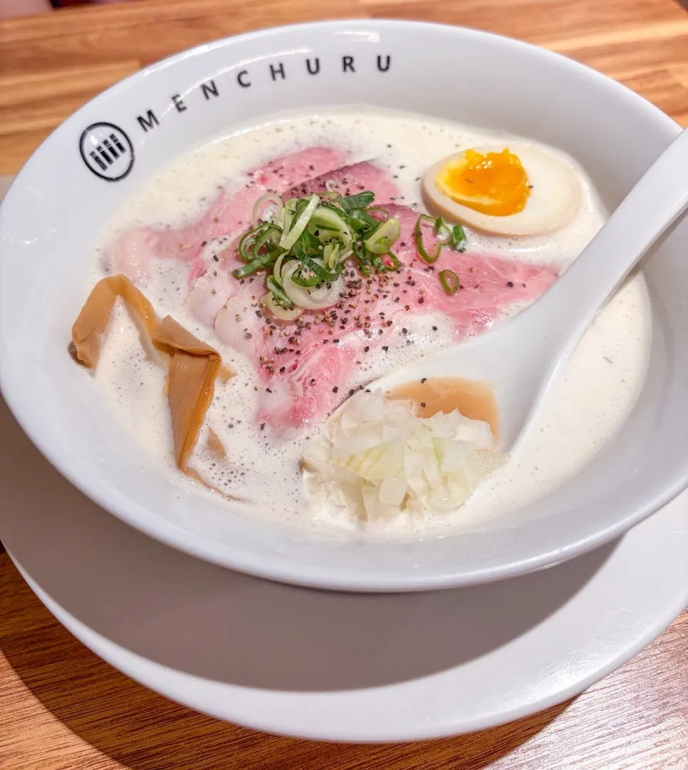 A bowl of milky-white tori paitan broth