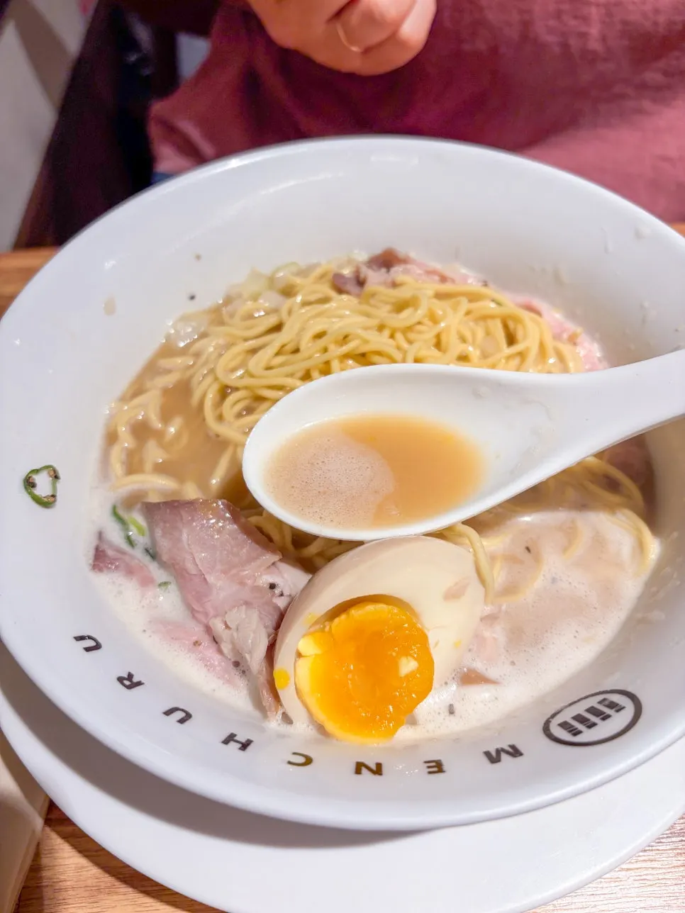 Scooping up the tori paitan broth