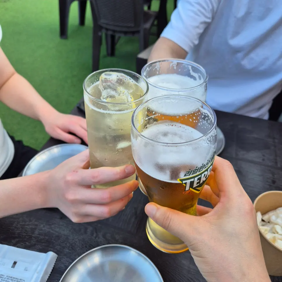 Two glasses of Terra draft beer and yuzu highball
