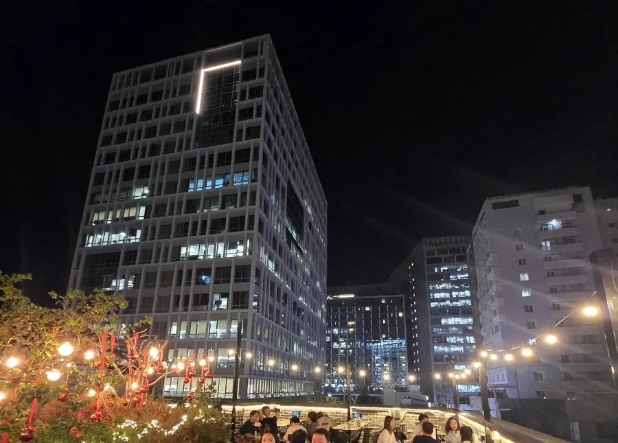 Lively rooftop gathering atmosphere