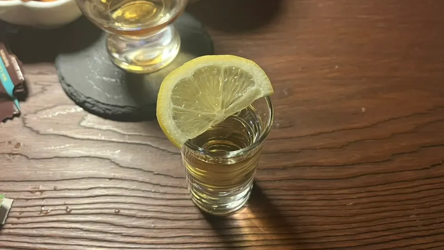 A glass of the 'Yahwa' liquor, limited to one per person