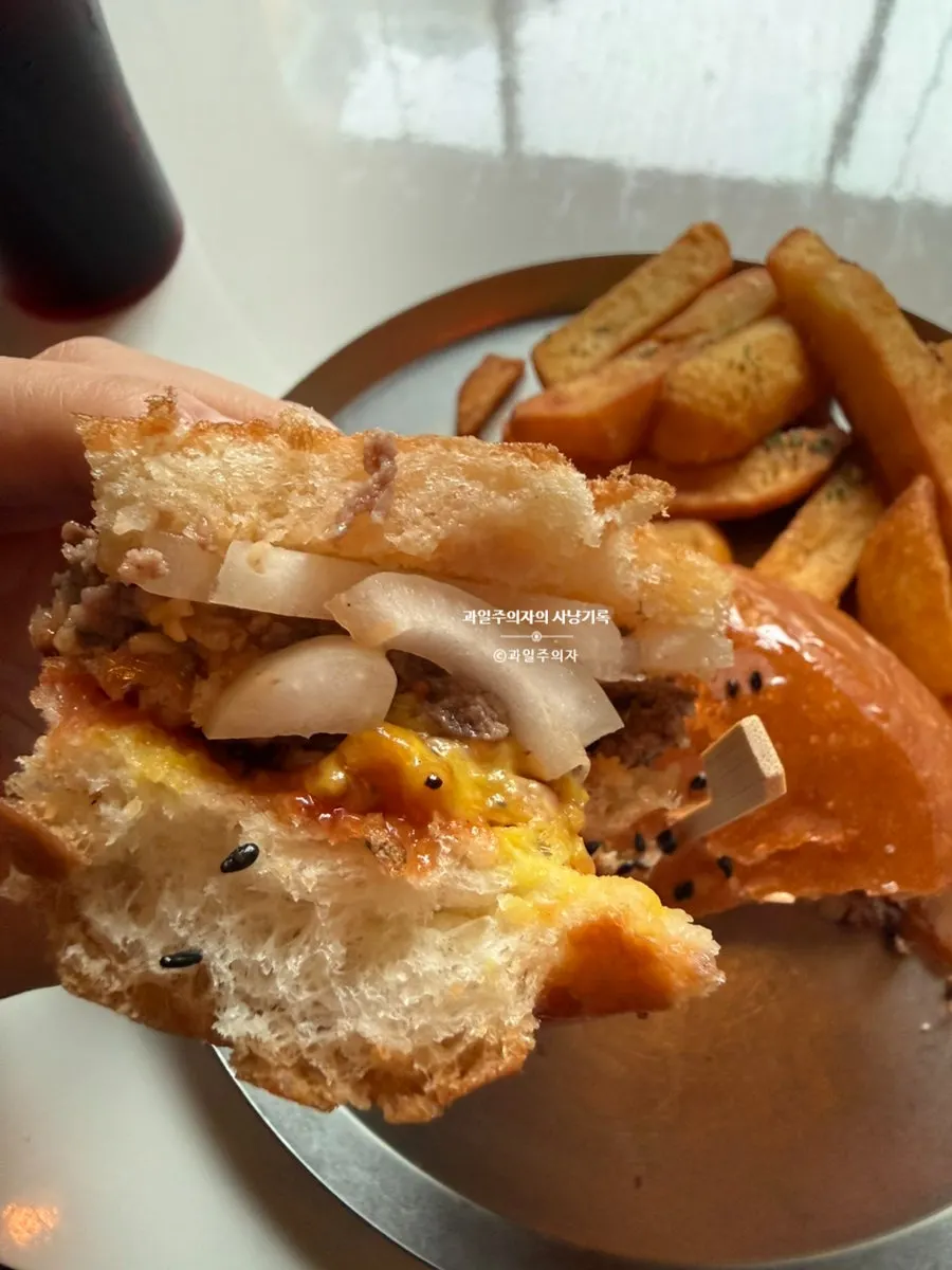 The bacon cheeseburger cut into pieces, easy to hold and eat
