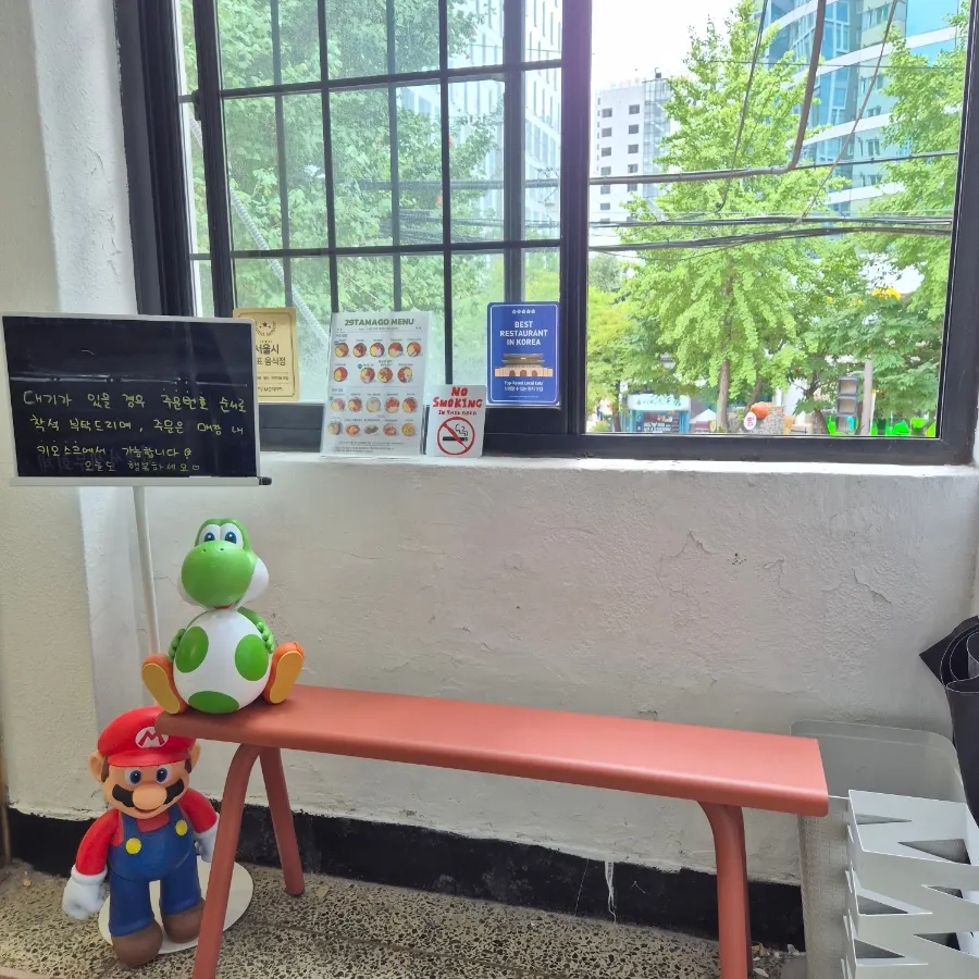 Standing signboard reading 'keto gimbap restaurant'