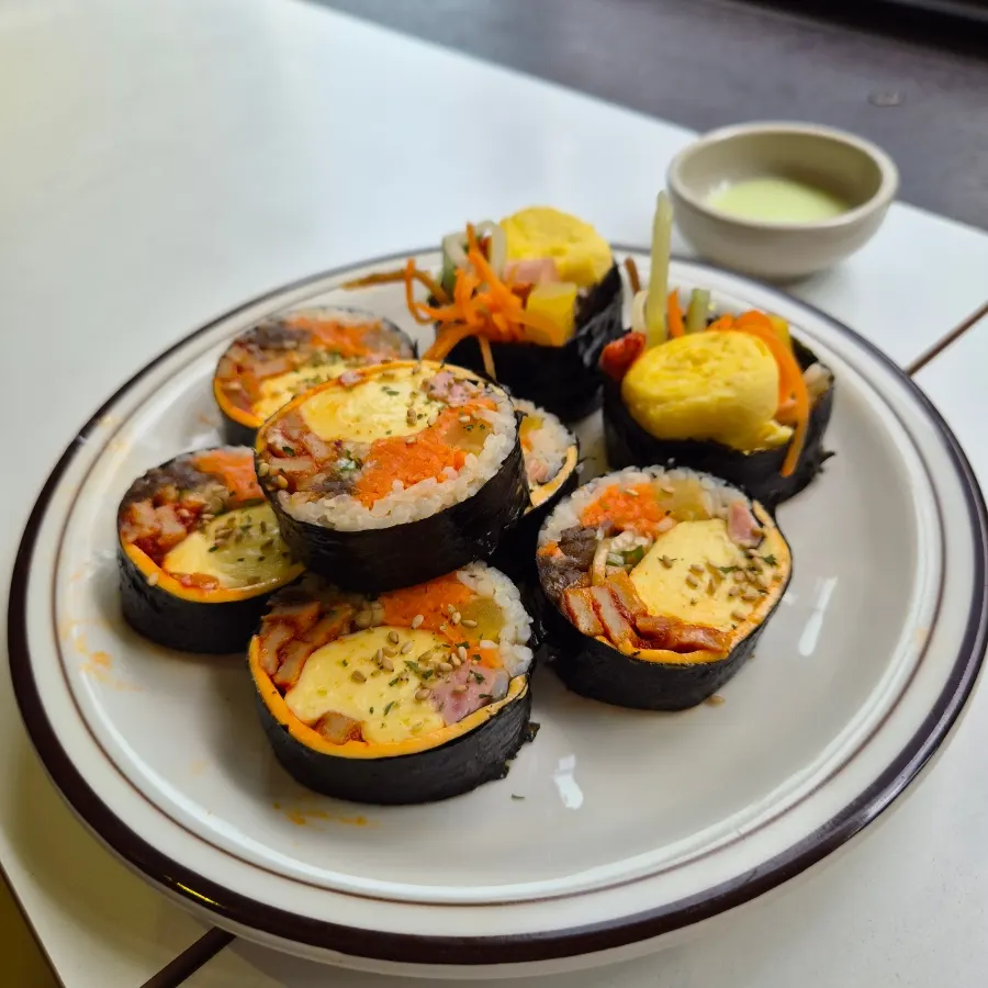 Plate of cheese vegetable whole egg roll gimbap