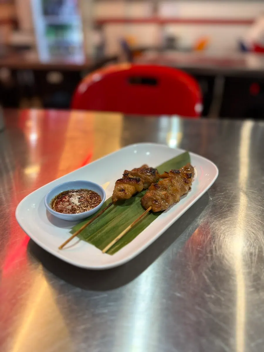 Charred moo ping and cold beer