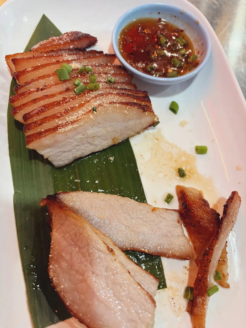 Thai-seasoned grilled pork neck, khao kha moo