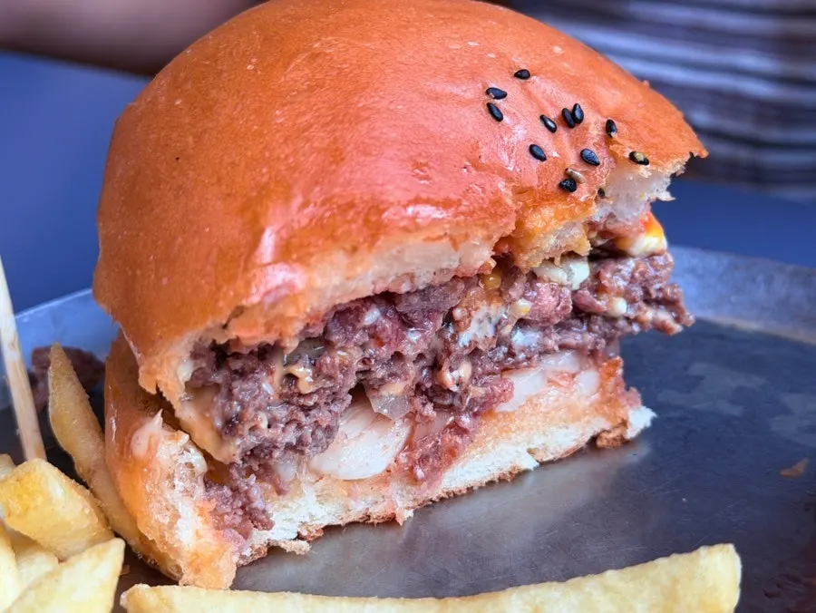 Cross-section of the double cheese burger with a thick patty