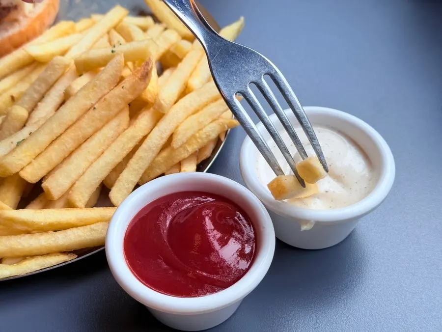 Fries with ketchup and ranch sauce