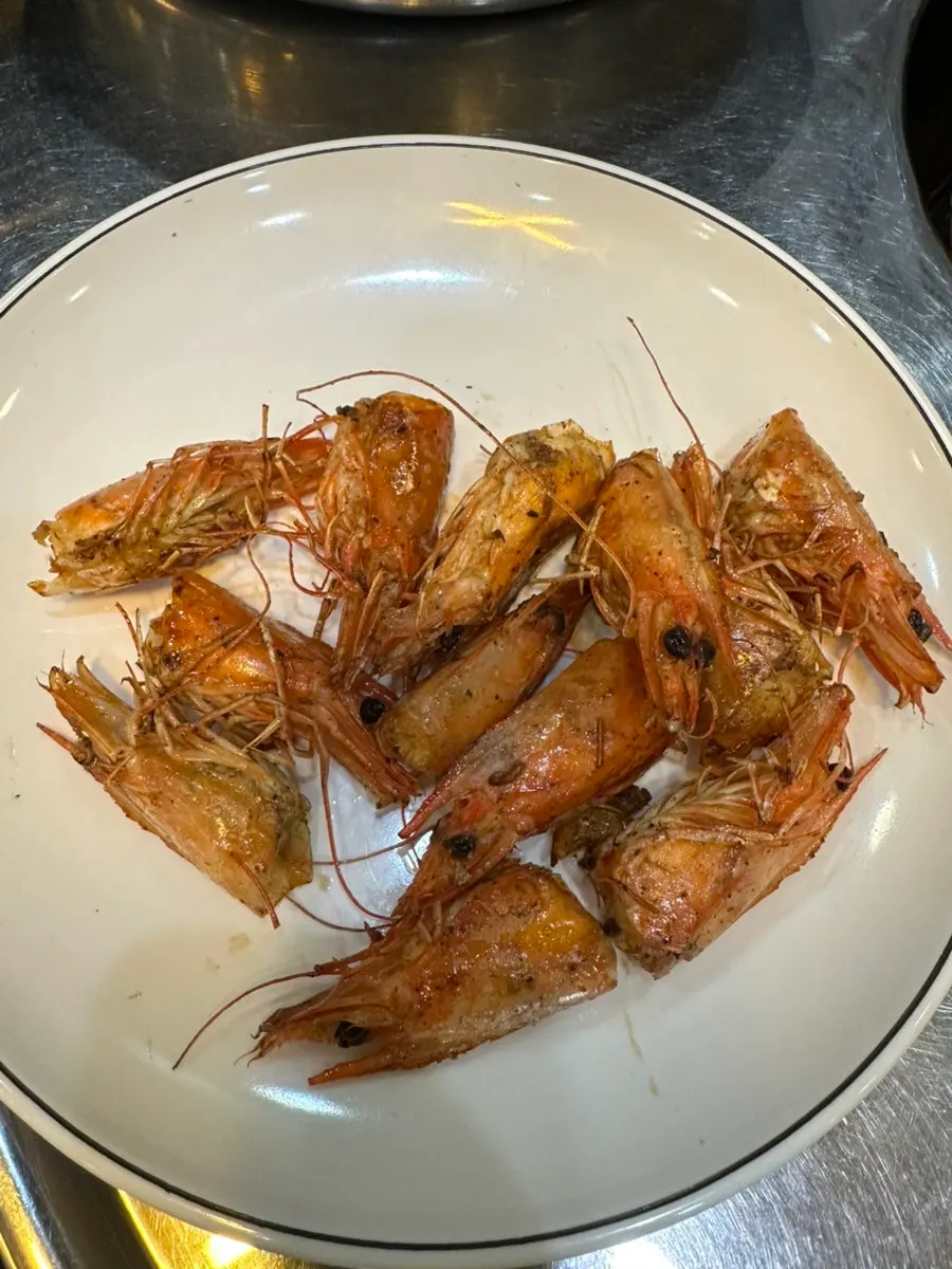 Gizzard shad meat eaten with rice