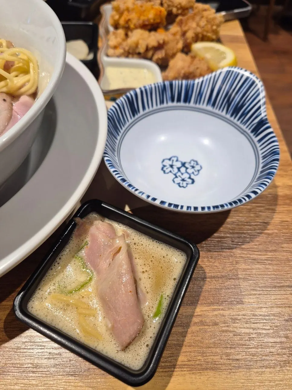 Tori paitan topped with three slices of meat