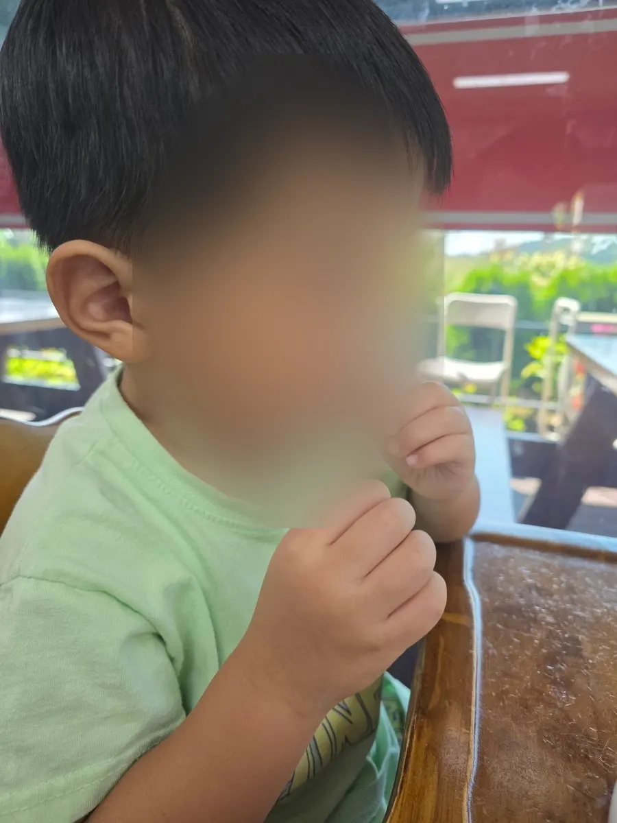 A child's first taste of octopus
