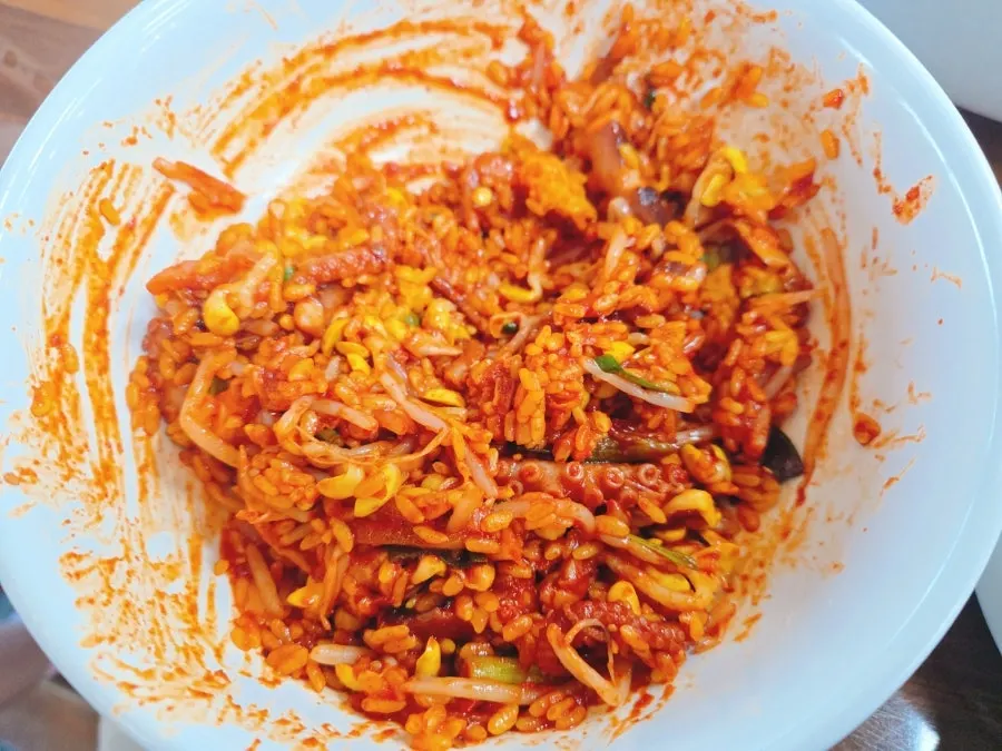 Spicy stir-fried octopus mixed with turmeric rice