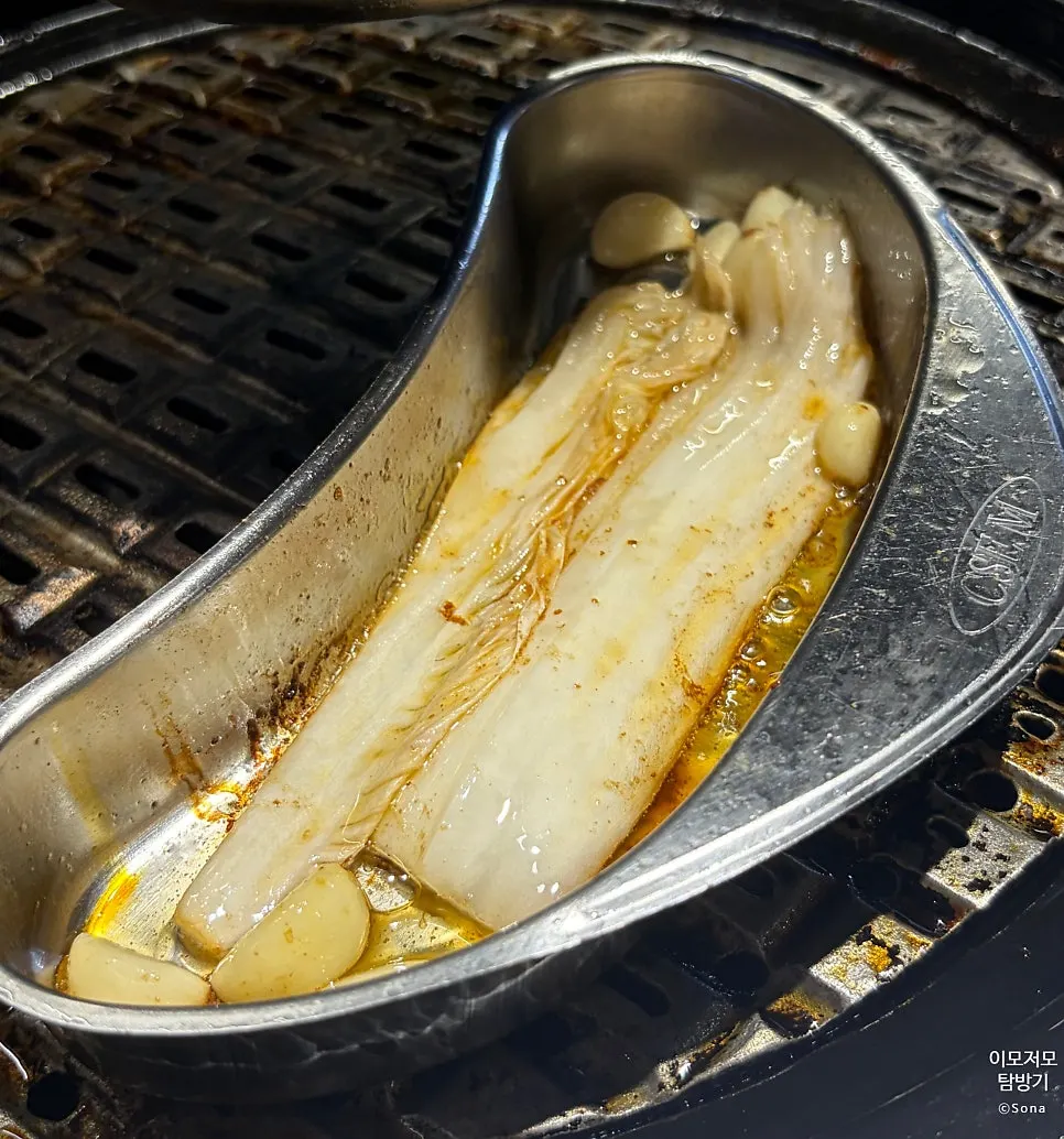 Golden-brown grilled gabrisal and mushrooms