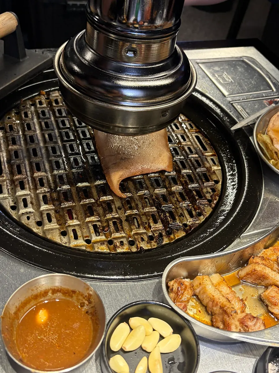 Meal with staff tending to the grill