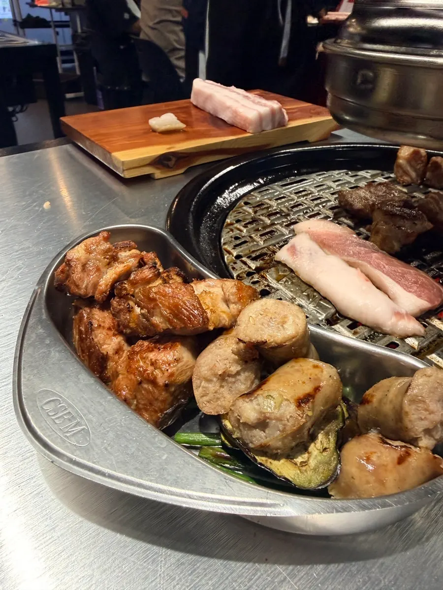 A meal with meat, stew, and rice