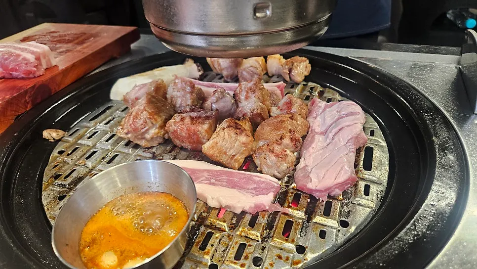 Cross-section of pork belly cut with scissors