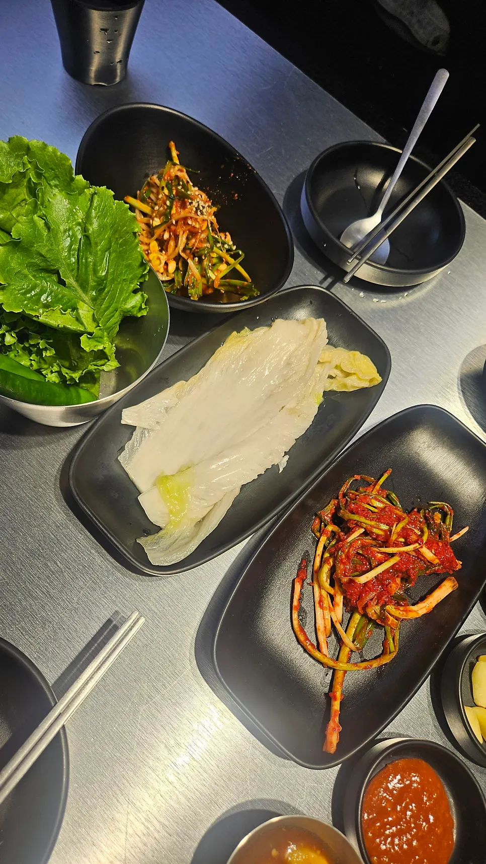 Green onion kimchi served with the meat