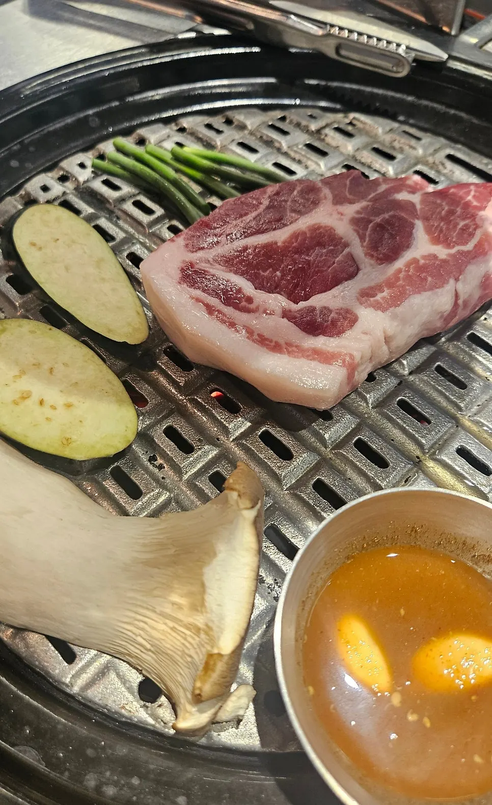 King oyster mushrooms, eggplant, and garlic scapes served with the platter