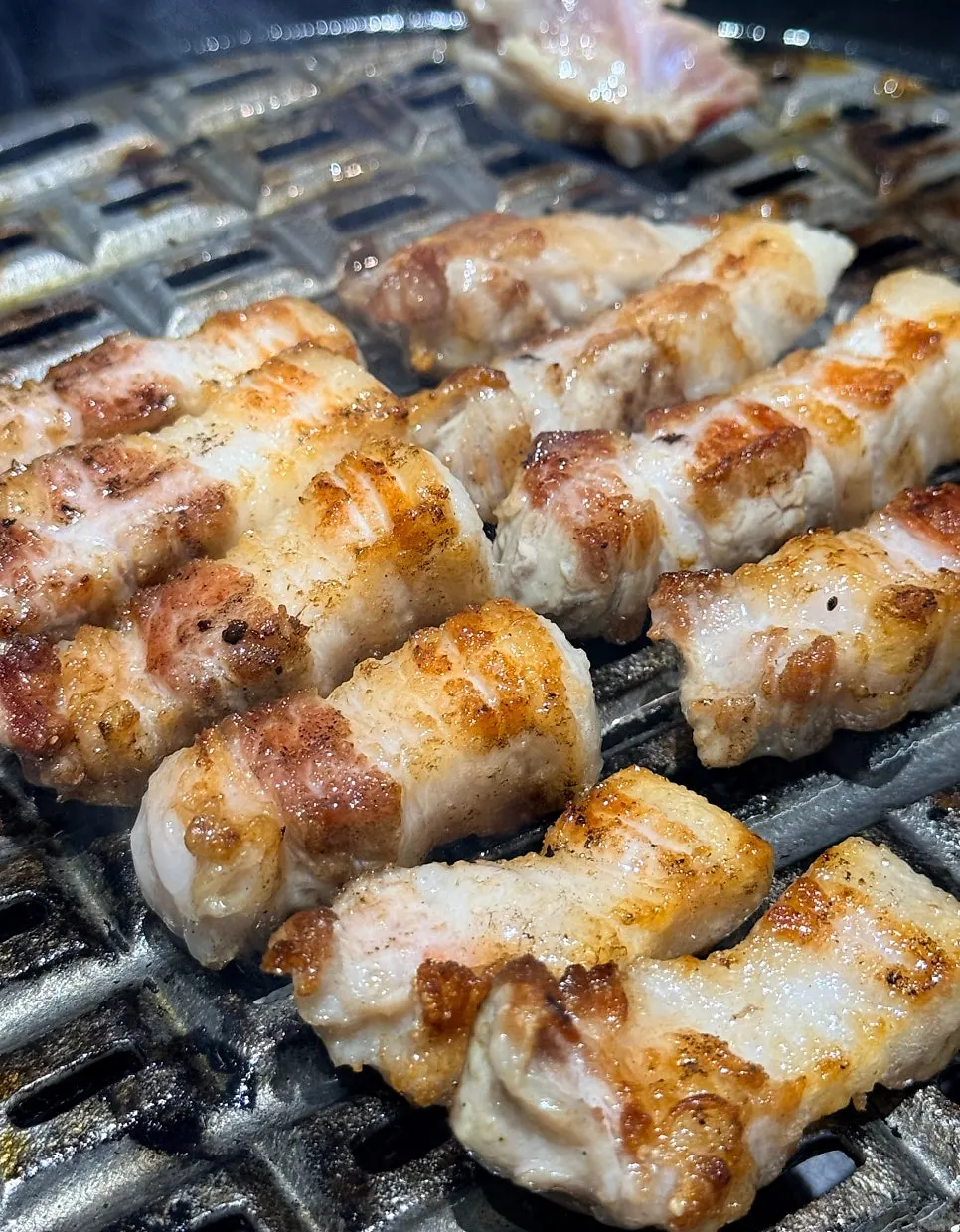 Thick cuts of meat being cut at just the right moment