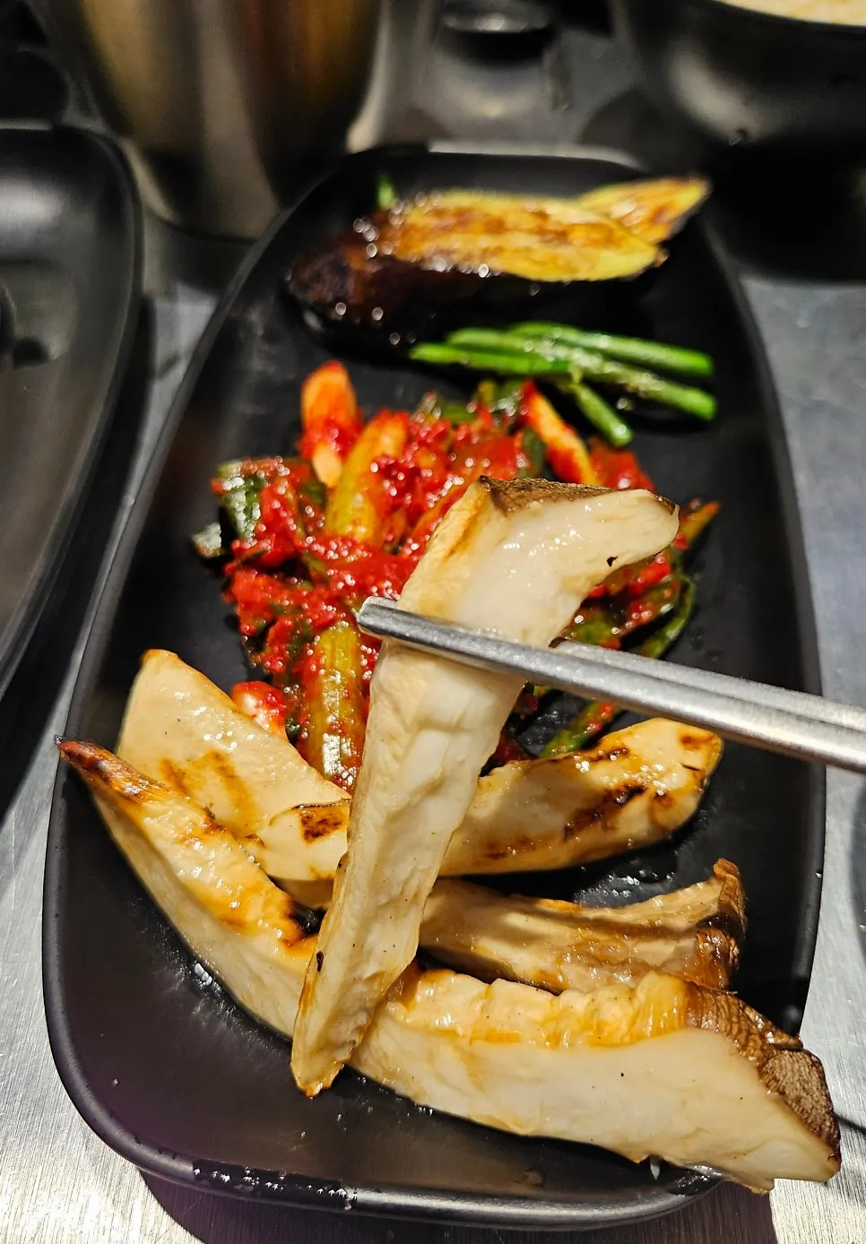 Eggplant and king oyster mushroom grilled to a moist finish
