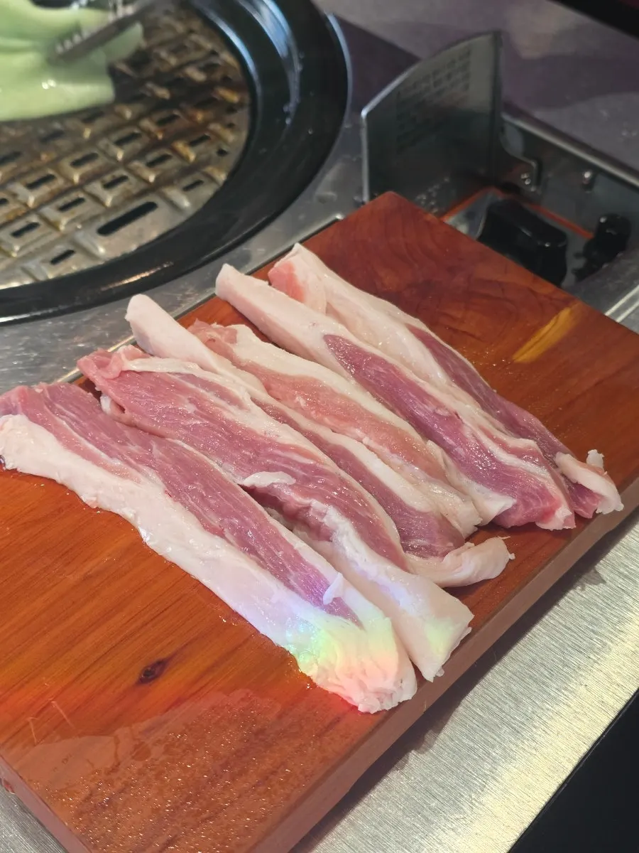 Raw meat board with vegetables ready to grill