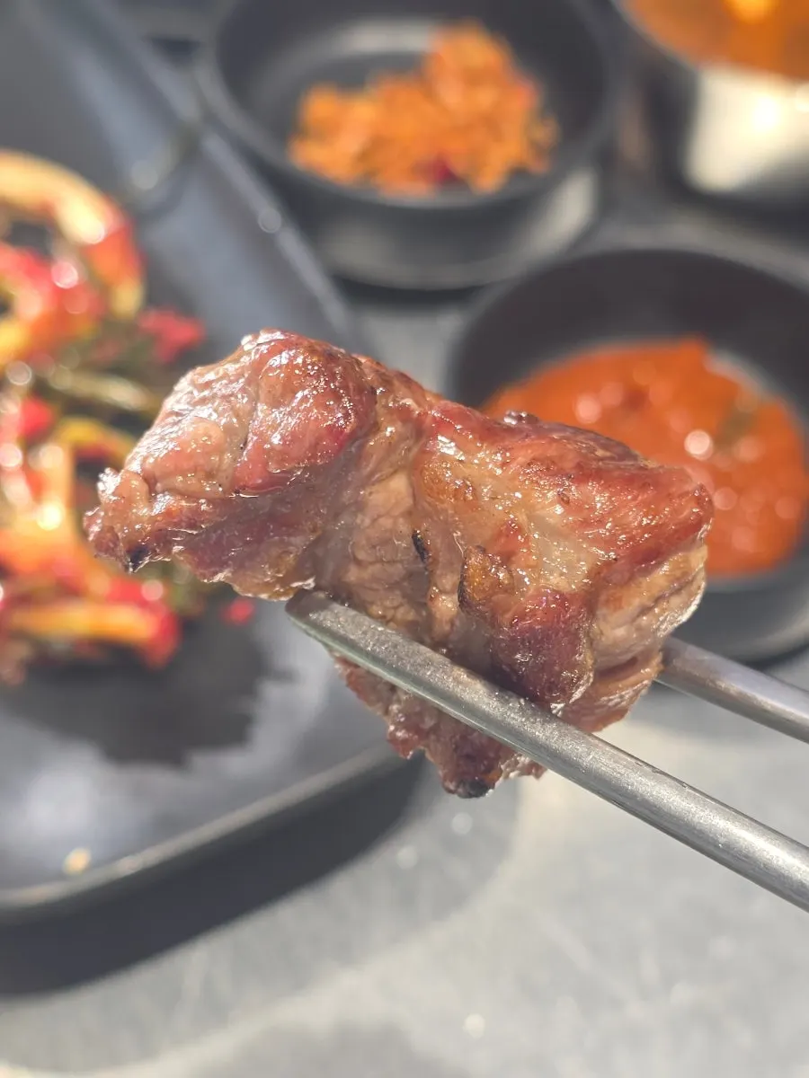 Cross-section of thickly grilled pork neck