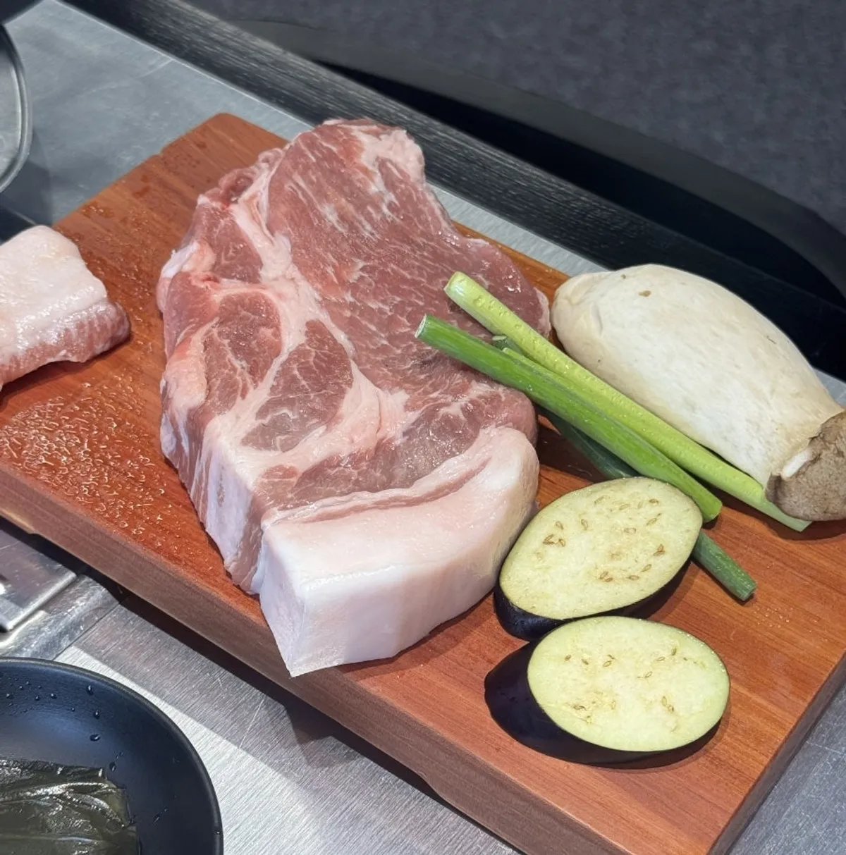 Full spread at Yukjjip: pork neck, gabrisal, and spicy soondubu jjigae
