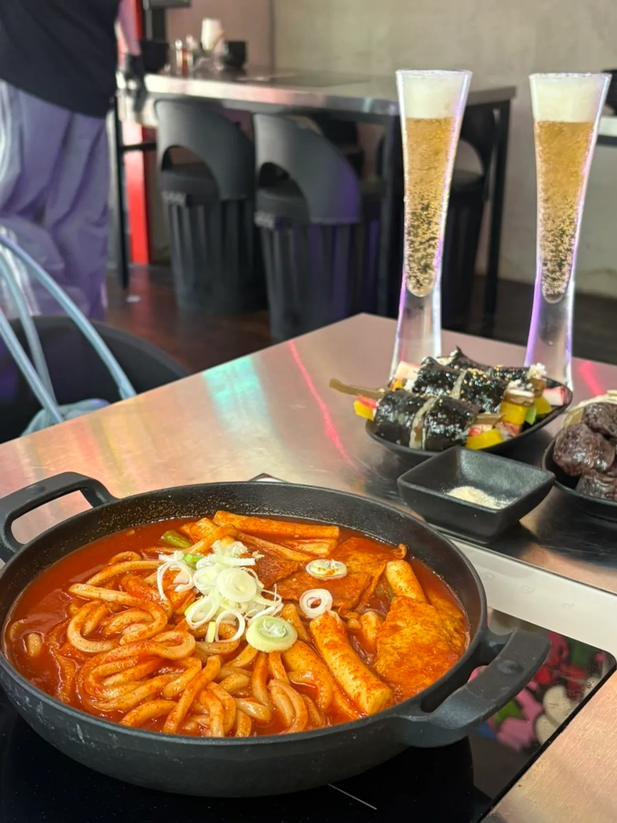 Gimbap-Tteok Single Set on the table with draft beer