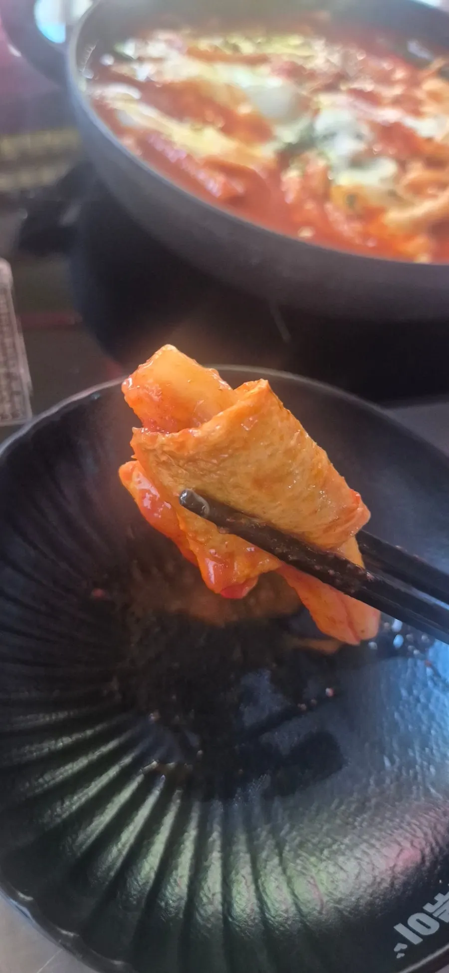 One serving of eungkeum tteokbokki with cheese added