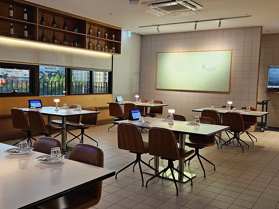 Interior with soft lighting and paintings on the walls