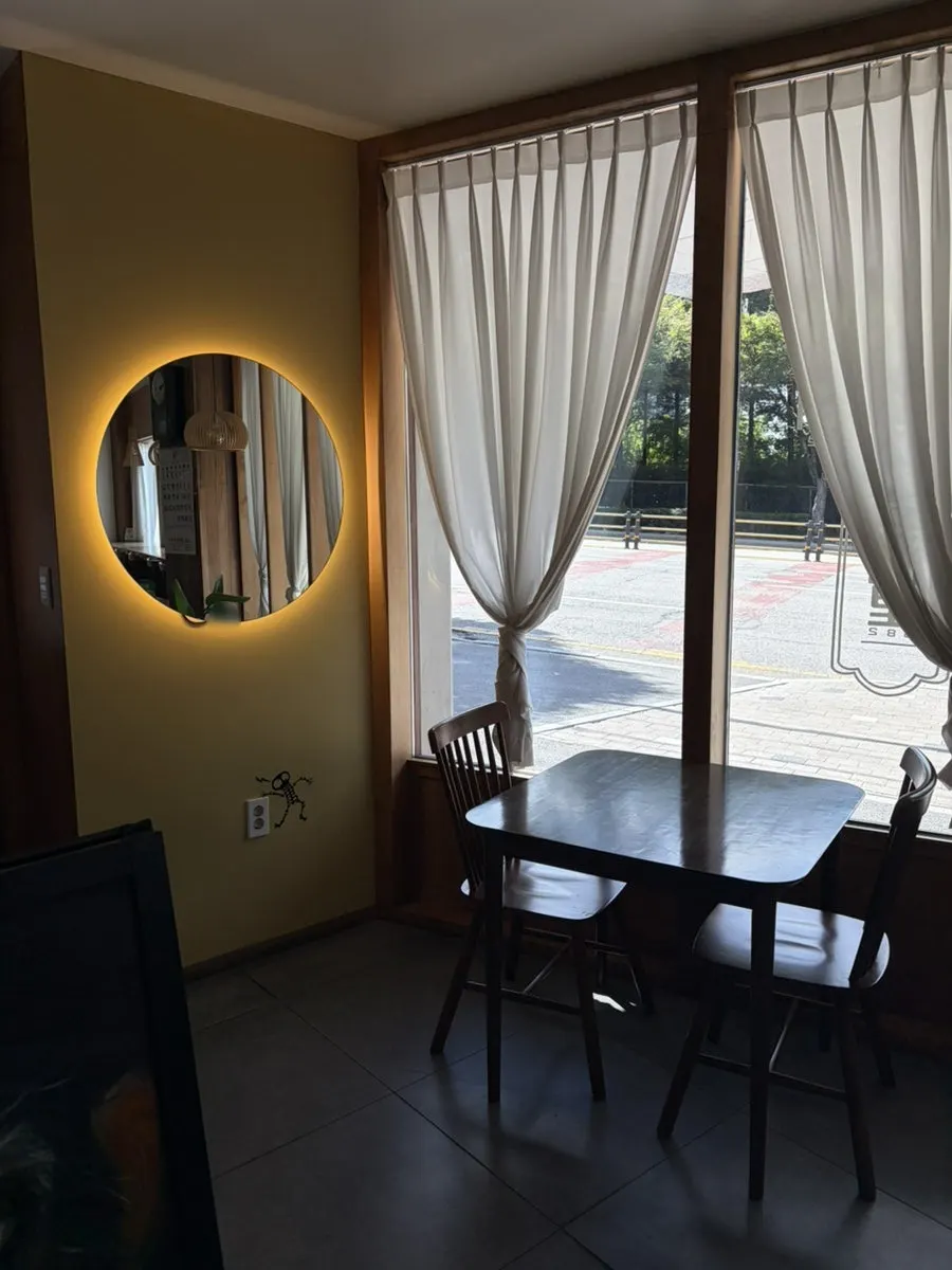 Interior of Eopcheonri382 Chungbuk National University Branch with large tables