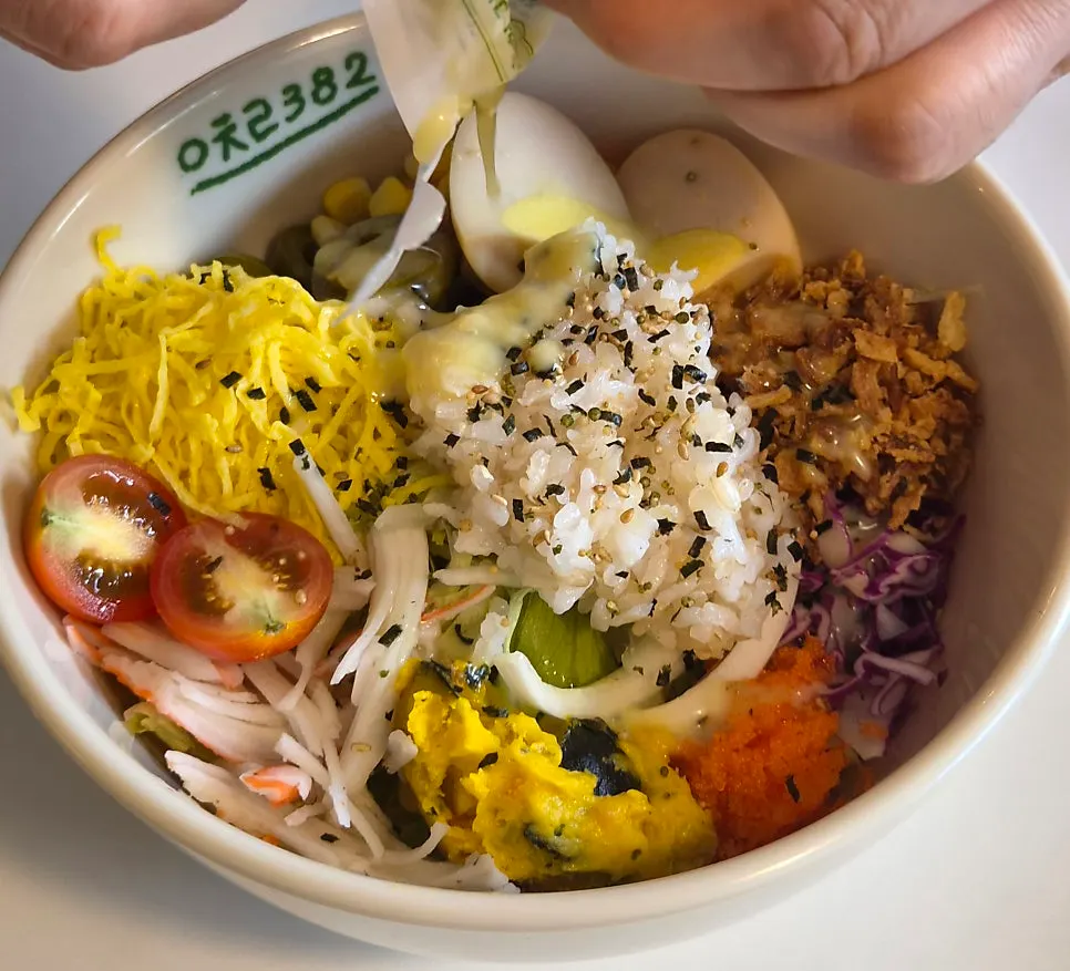 Poke mixed with the dressing drizzled on top